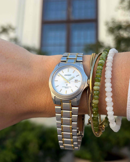 Orient Vintage Watch: Ladies Vintage 90s Light Silver Dial Two-Tone Bracelet
