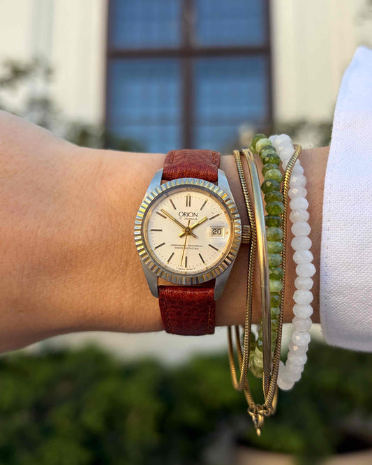 Orion Ladies Watch: Vintage Mechanical Fluted Bezel 70s Gold Two-Tone Sunburst Dial