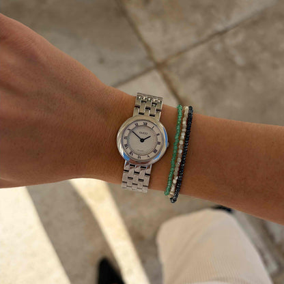 Gucci 546p Watch: Vintage Ladies 90s Silver with Classic Roman Numerals