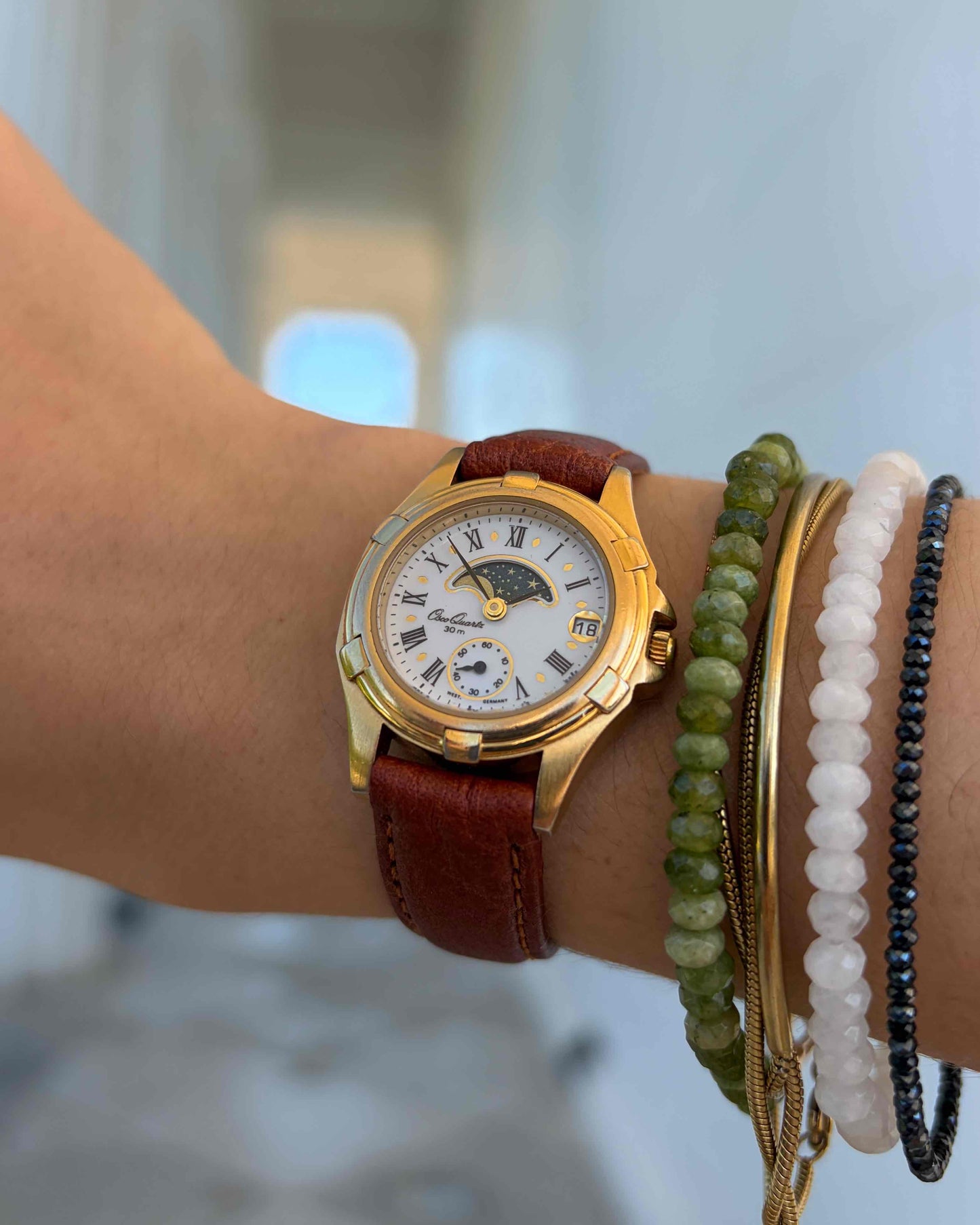 Osco Moon Phase Watch: Ladies 90s Gold Roman Numerals Blue White Dial