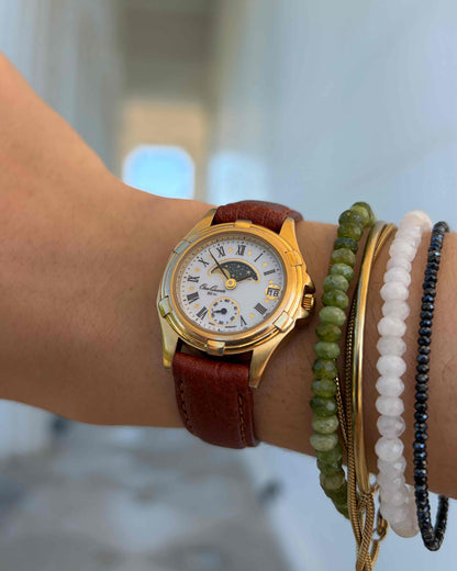 Osco Moon Phase Watch: Ladies 90s Gold Roman Numerals Blue White Dial