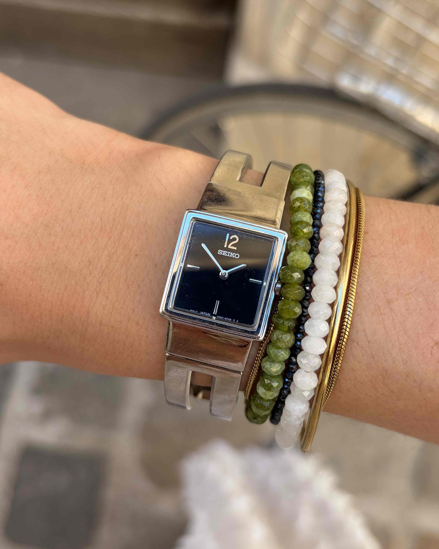 Seiko Vintage Watch: 90s Silver Black Dial Integrated Bracelet