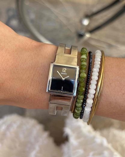 Seiko Vintage Watch: 90s Silver Black Dial Integrated Bracelet