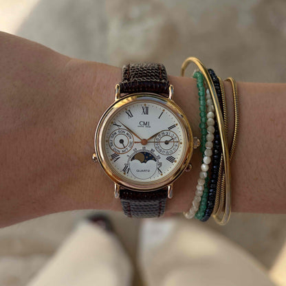 CMI Moon Phase Watch: Ladies 90s Gold Roman Numerals Blue Day Date