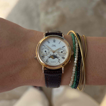 CMI Moon Phase Watch: Ladies 90s Gold Roman Numerals Blue Day Date