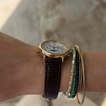 CMI Moon Phase Watch: Ladies 90s Gold Roman Numerals Blue Day Date