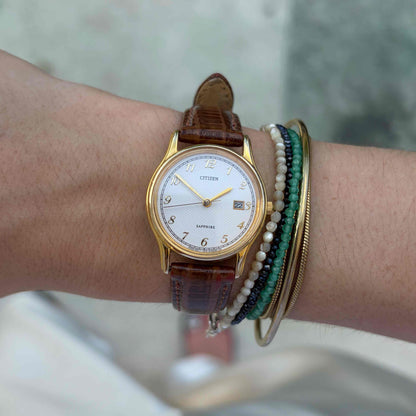 Citizen Ladies Watch: Vintage Dainty 80s Golden Structured Guilloche Dial