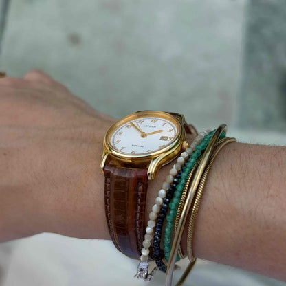 Citizen Ladies Watch: Vintage Dainty 80s Golden Structured Guilloche Dial