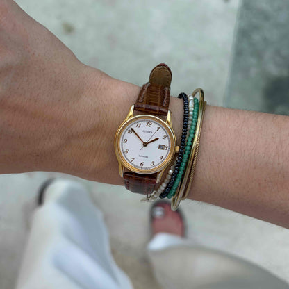 Citizen Ladies Watch: Vintage Dainty 80s Golden Structured Guilloche Dial
