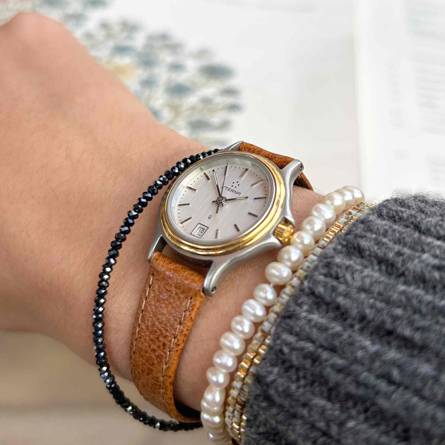 Eterna Vintage Watch: Ladies 80s Gold with White Linen Dial