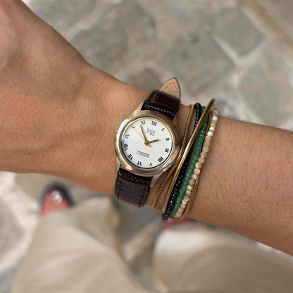 Osco Dainty Watch: Vintage Ladies 80s Golden Two-Tone White Roman Dial