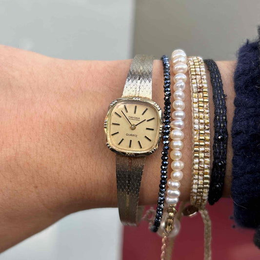 Oriosa Cocktail Watch: Ladies 70s Gold with Champagne Dial