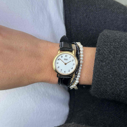 Seiko Vintage Ronde: Ladies Watch 90s Gold White Arabic Dial