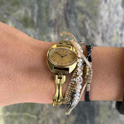 Tissot Cocktail Watch: Ladies 70s Mechanical Iconic with Golden Dial - Mint