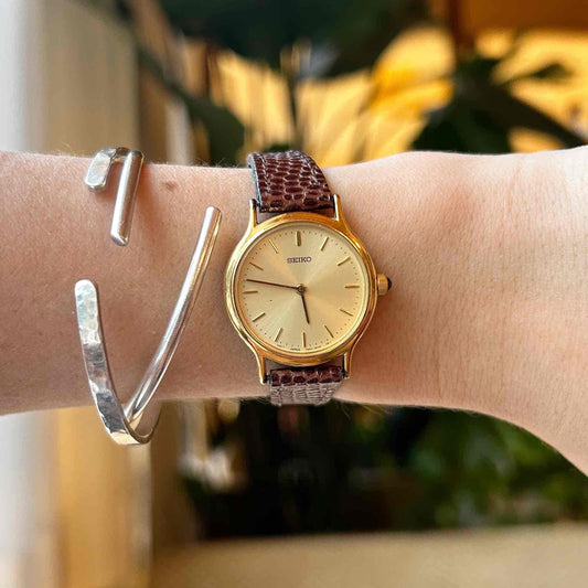 Seiko Vintage Watch: Ladies 80s Gold with Sunburst Champagne Dial