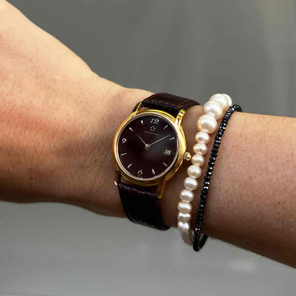 Eterna Vintage Watch: Ladies 90s Gold with Burgundy Colored Dial