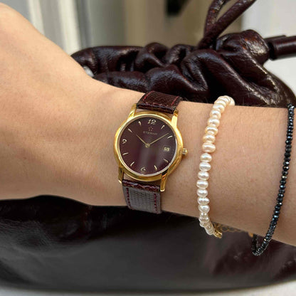 Eterna Vintage Watch: Ladies 90s Gold with Burgundy Colored Dial