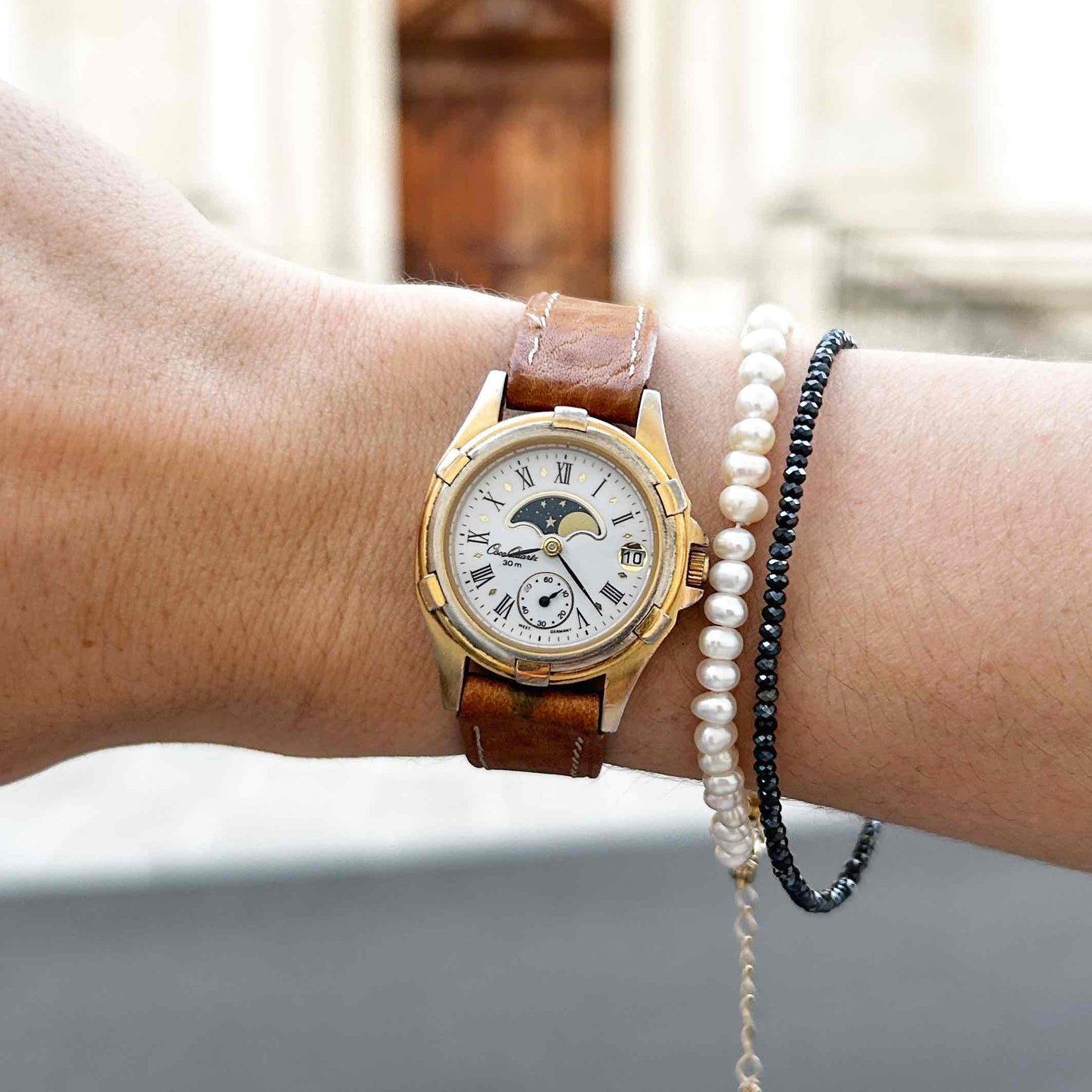 Osco Moon Phase Watch: Ladies 90s Gold with Roman Numerals Blue White Dial