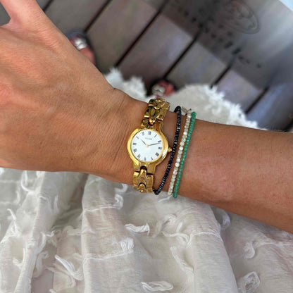 Pulsar by Seiko Cocktail Watch: Vintage Ladies 80s Golden with White Roman Dial