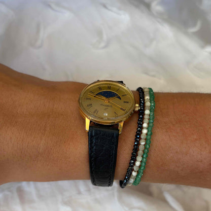 Regent Moon Phase Watch: Ladies 80s Gold with Roman Numerals Blue Gold Dial