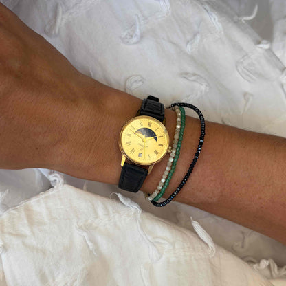 Regent Moon Phase Watch: Ladies 80s Gold with Roman Numerals Blue Gold Dial