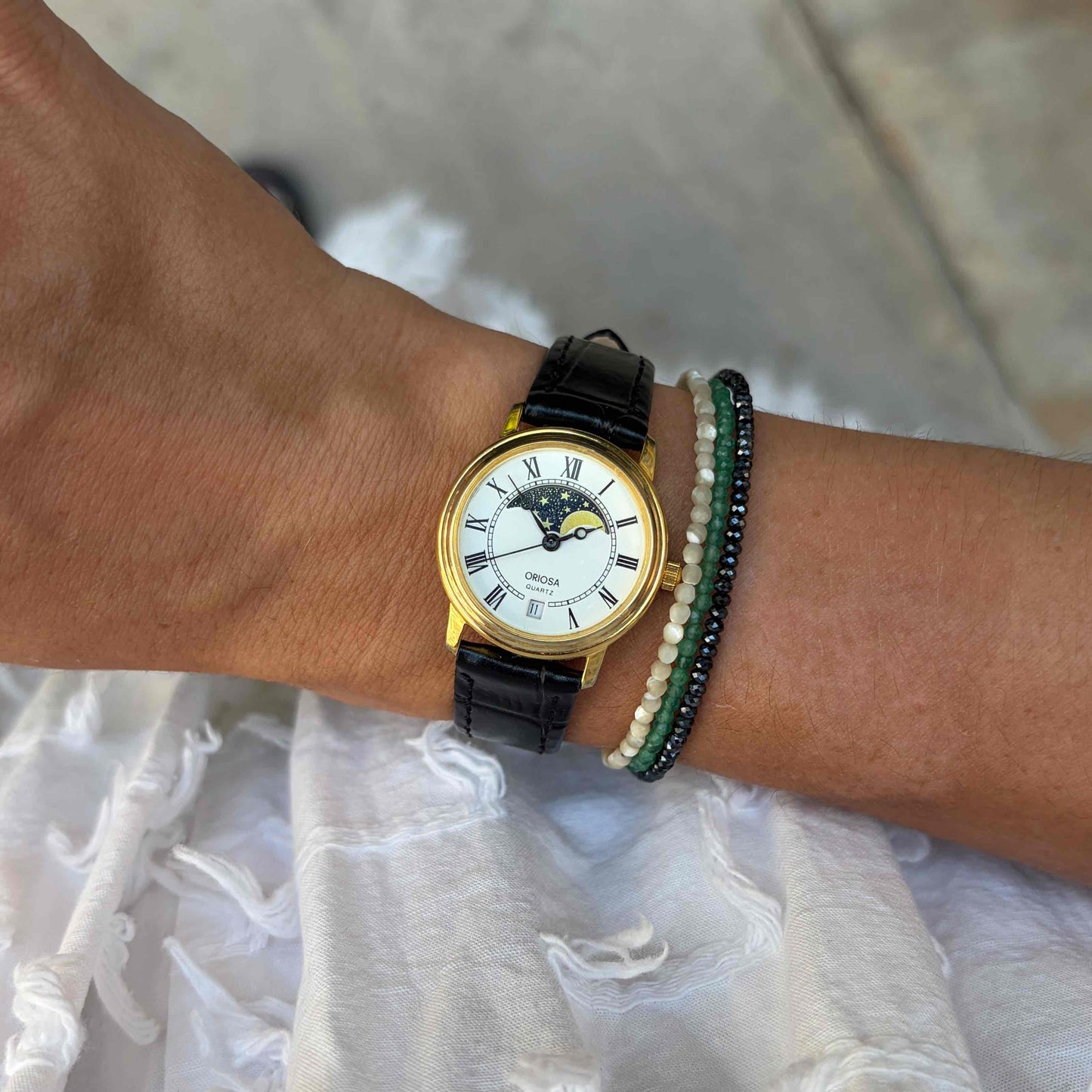 Oriosa Moon Phase Watch: Ladies 90s Gold with Roman Numerals Blue White Dial