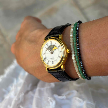 Oriosa Moon Phase Watch: Ladies 90s Gold with Roman Numerals Blue White Dial