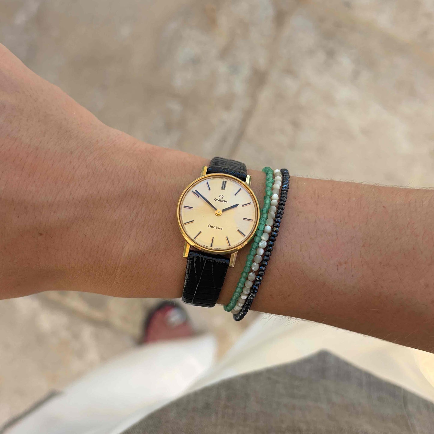 Omega Geneve Dainty: Ladies 70s Hand-Wound Sunburst Champagne Dial