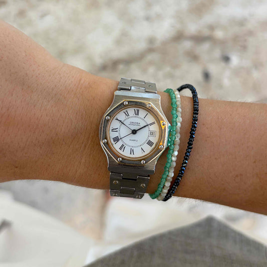 Oriosa Dainty Watch: Ladies 70s Two-Tone Gold with Roman Dial