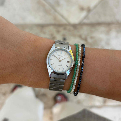 Orient Vintage Watch: Ladies Vintage 90s White Silver Dial and Date
