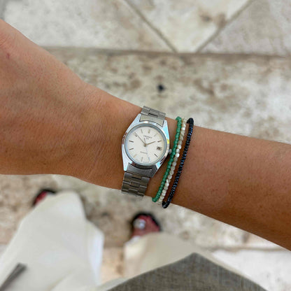 Orient Vintage Watch: Ladies Vintage 90s White Silver Dial and Date