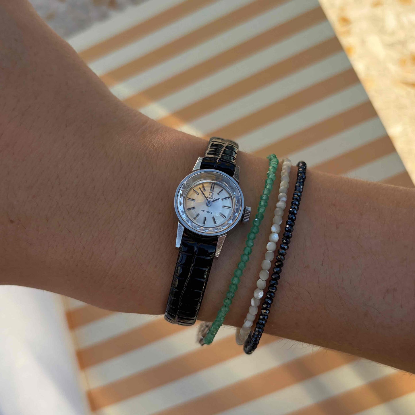 Omega DeVille Cocktail: Ladies 60s Hand-Wound Silver Dial Faceted Glass