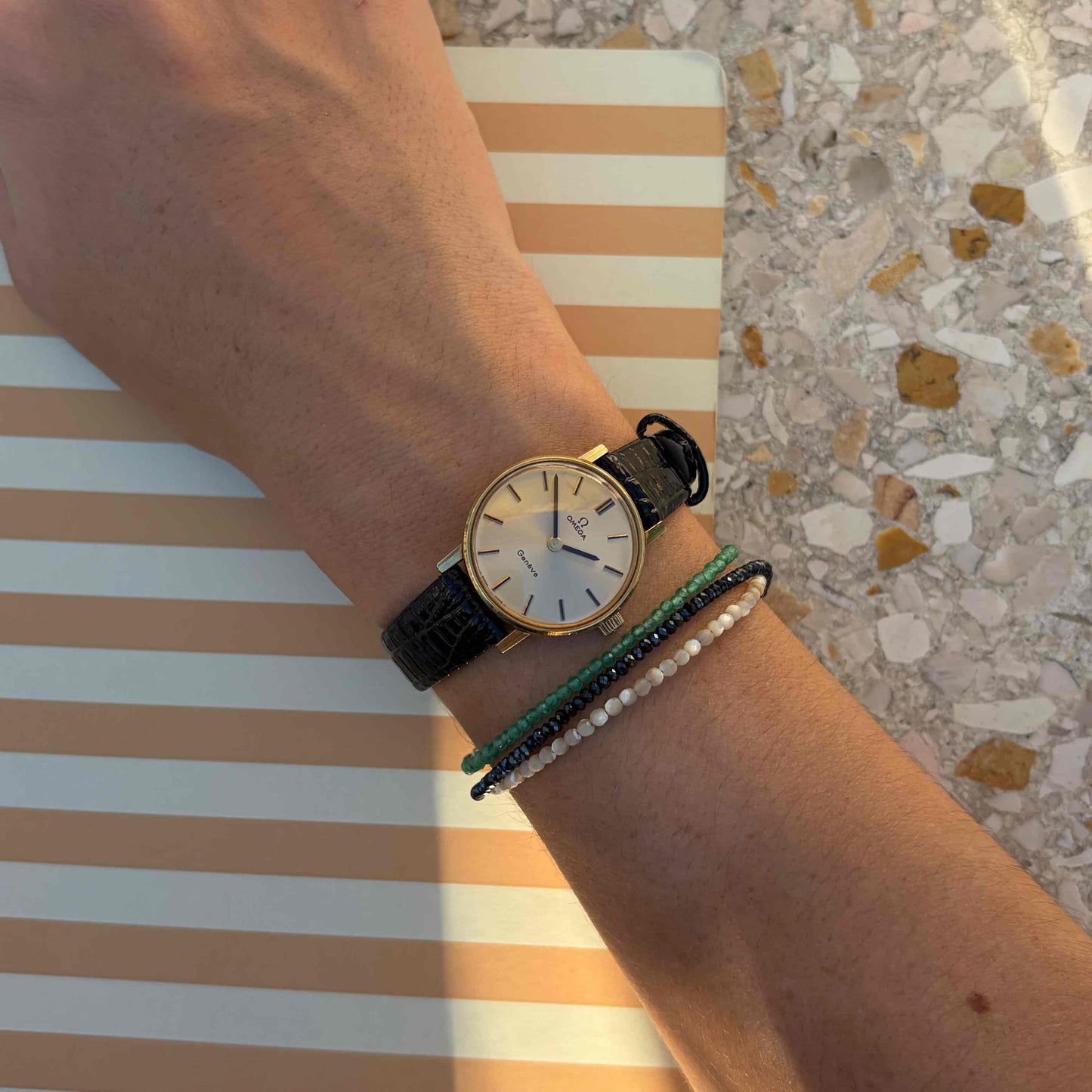 Omega Geneve Dainty: Ladies 70s Hand-Wound Sunburst Champagne Dial