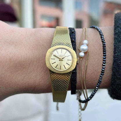 Pallas Cocktail Watch: Ladies 70s Mechanical White Sunburst Dial
