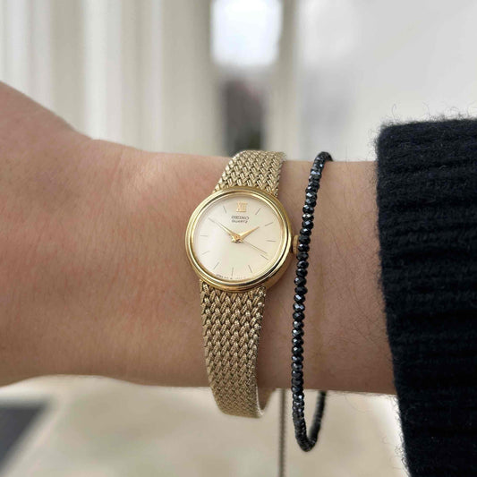 Seiko Cocktail Watch: Ladies Vintage 90s Ivory Dial Woven Bracelet