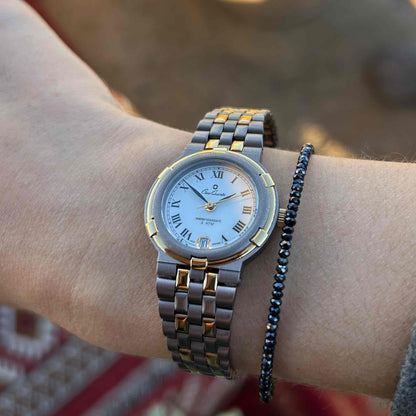 Vintage Osco Titan: Ladies 90s Gold with Elegant White Roman Dial - NOS