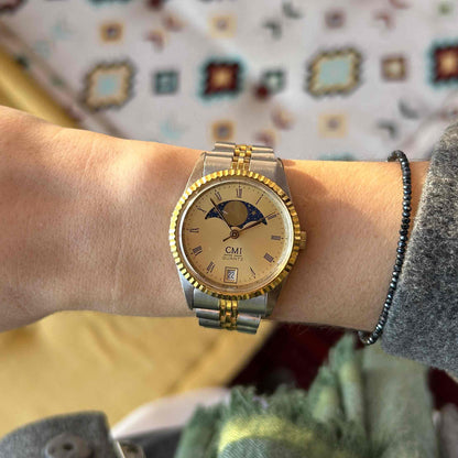 CMI Moon Phase Watch: Ladies 80s Gold with Roman Numerals Blue Champaign Dial