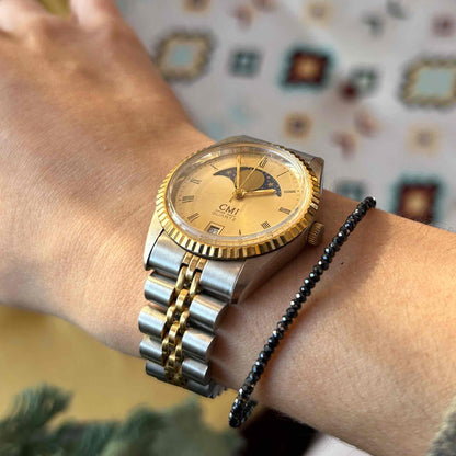 CMI Moon Phase Watch: Ladies 80s Gold with Roman Numerals Blue Champaign Dial