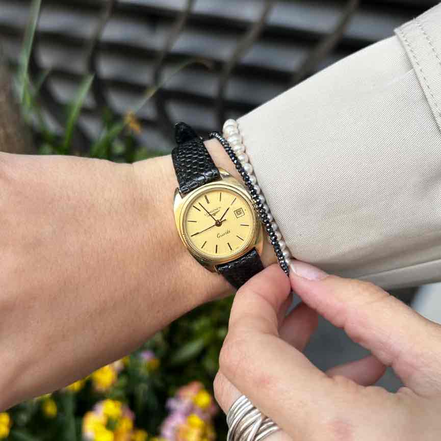 Longines Vintage Watch: Ladies 80s Golden with Champagne Dial