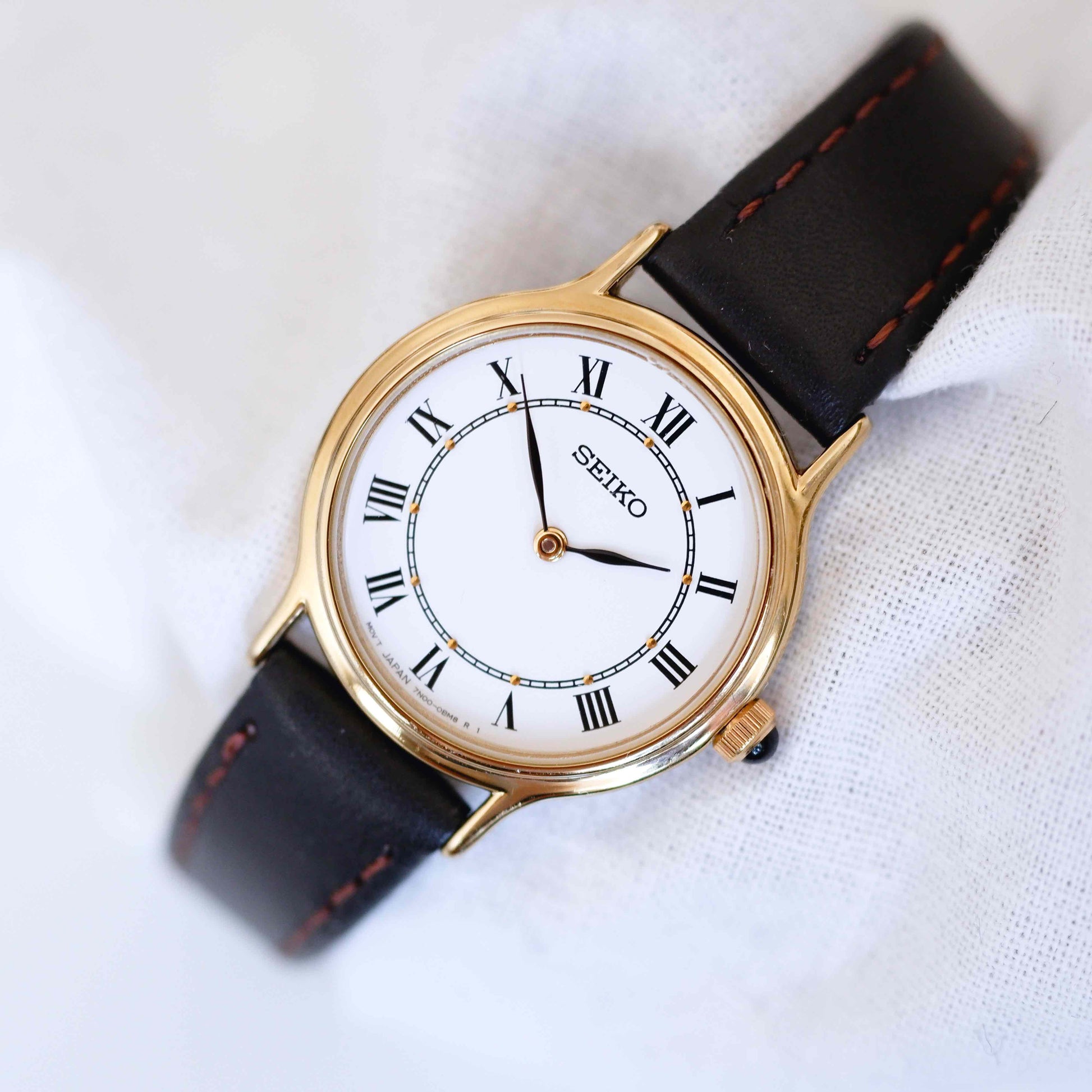 Seiko Vintage Ladies Watch: 90s Gold with Elegant Roman Numerals, Second Front Side