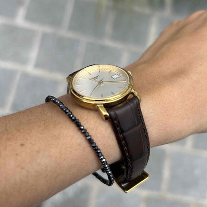 Tissot Vintage Watch: Ladies 90s Golden Iconic Design with White Sunburst Dial