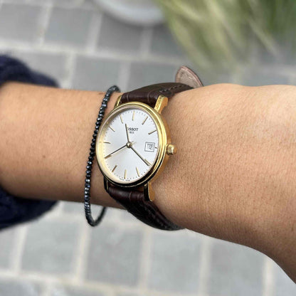 Tissot Vintage Watch: Ladies 90s Golden Iconic Design with White Sunburst Dial