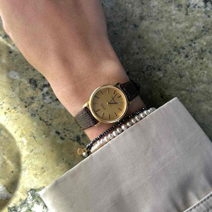Tissot Vintage Watch: Ladies 90s Golden Iconic with Champagne Dial