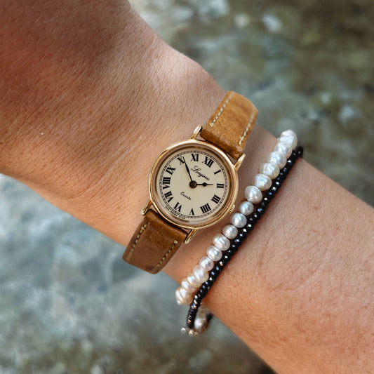 Longines Vintage Watch: Dainty Ladies 80s Golden with Ivory Dial